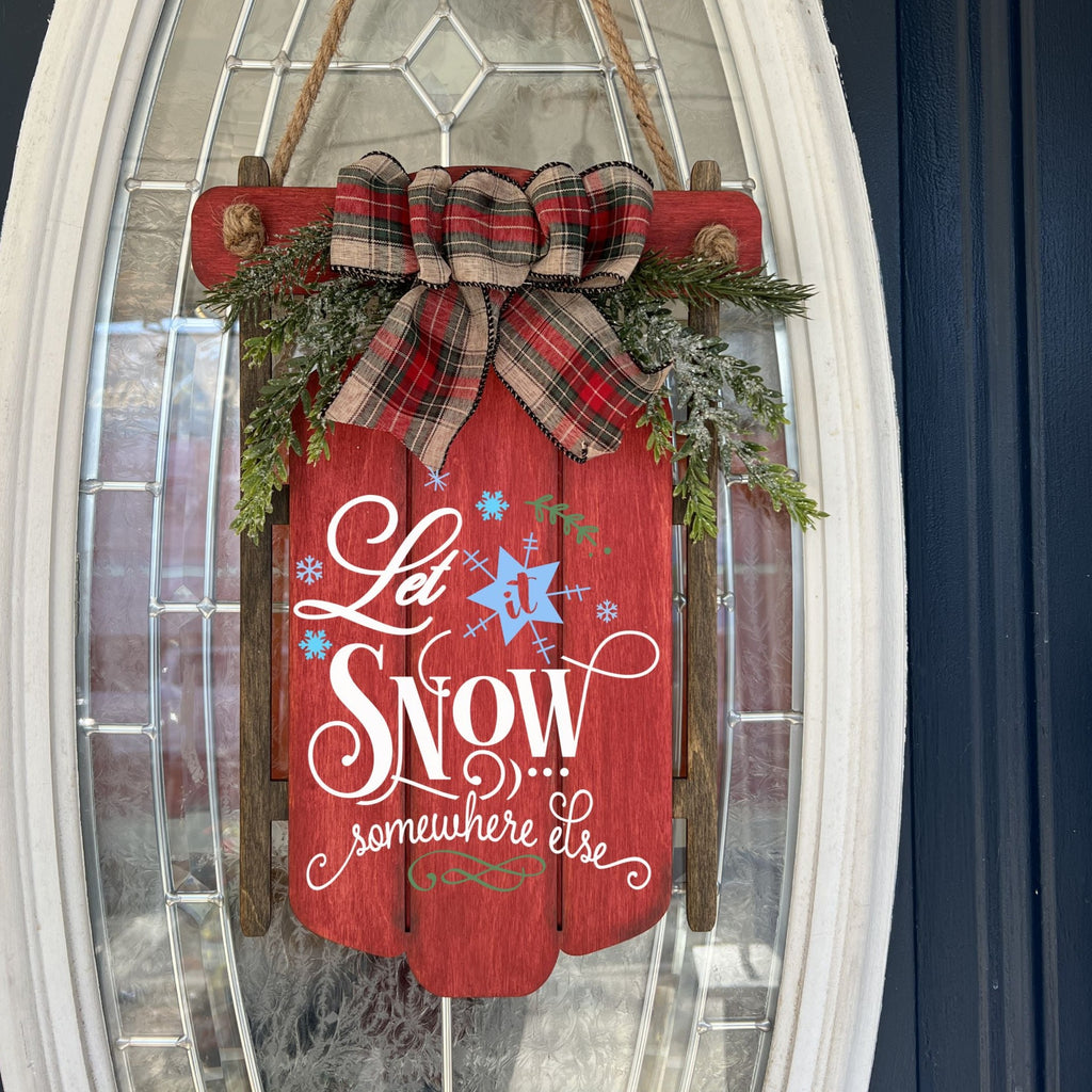 Let It Snow Somewhere Else Sled Doorhanger